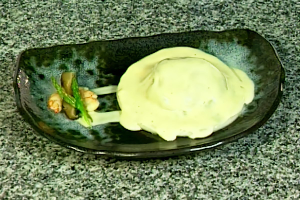 Raviol al estilo asiático con jugo de ave y langostinos El Gourmet